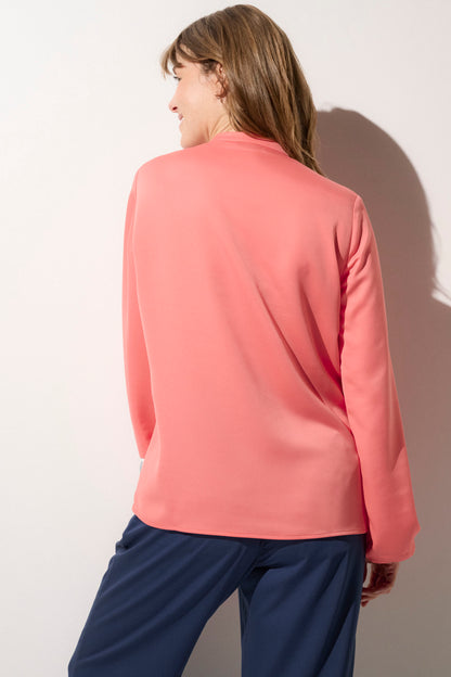 Blouse anti-UV rose pour femme, manches longues et légère, idéale pour une protection solaire élégante au quotidien.