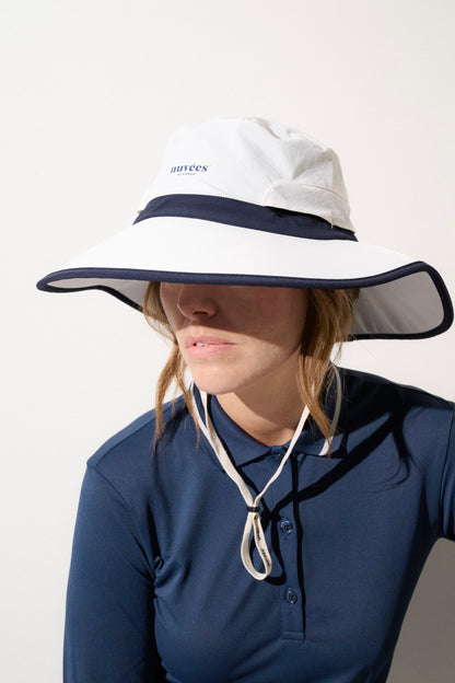 Chapeau anti-UV UPF50+ pour femme, léger et élégant, idéal pour le golf et les sports en extérieur.