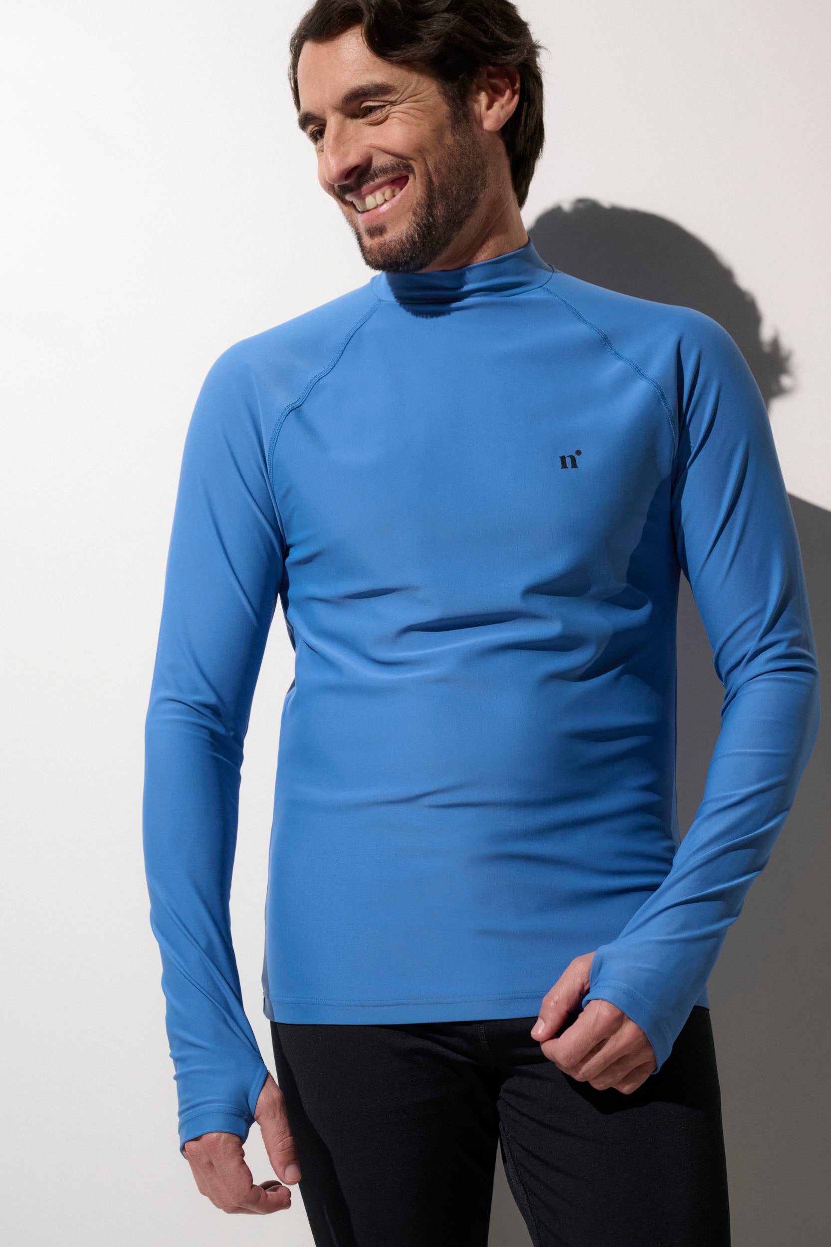 T-shirt de bain anti-UV bleu pour homme, UPF 50+, léger et respirant, idéal pour les activités aquatiques.