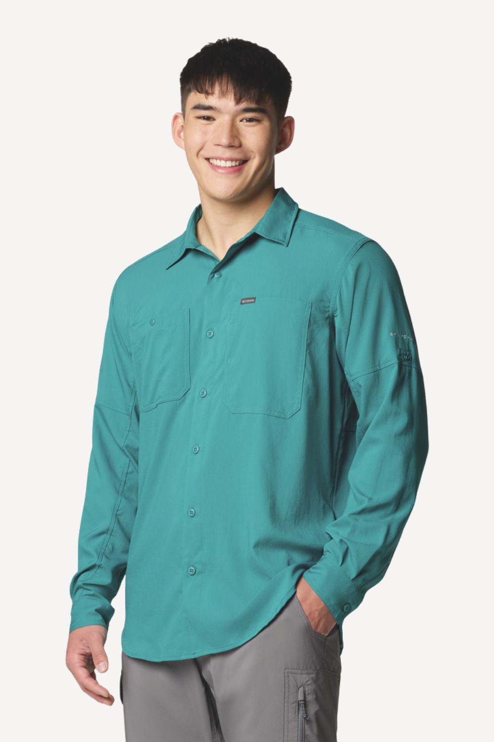 Chemise anti-UV turquoise pour homme, UPF50+, légère et respirante, idéale pour activités de plein air.