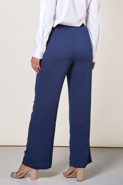 Pantalon anti-UV bleu pour femme, léger et respirant, certifié UPF 50+, idéal pour des sorties ensoleillées.