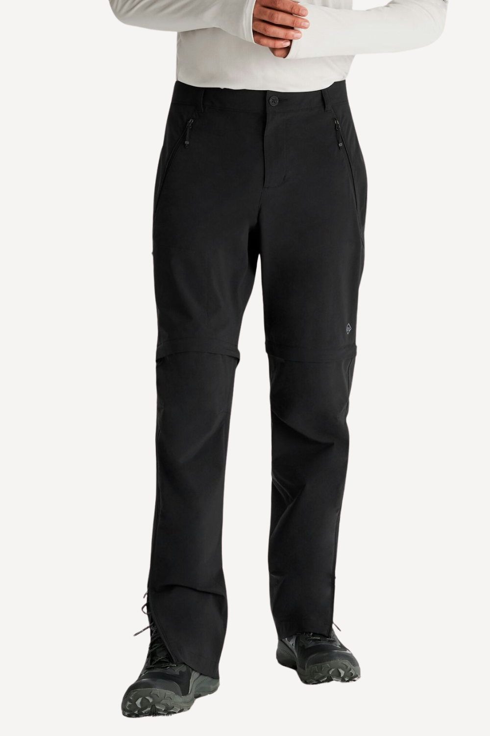 Pantalon anti-UV convertible noir pour homme, léger, UPF 50+, parfait pour les aventures en plein air.