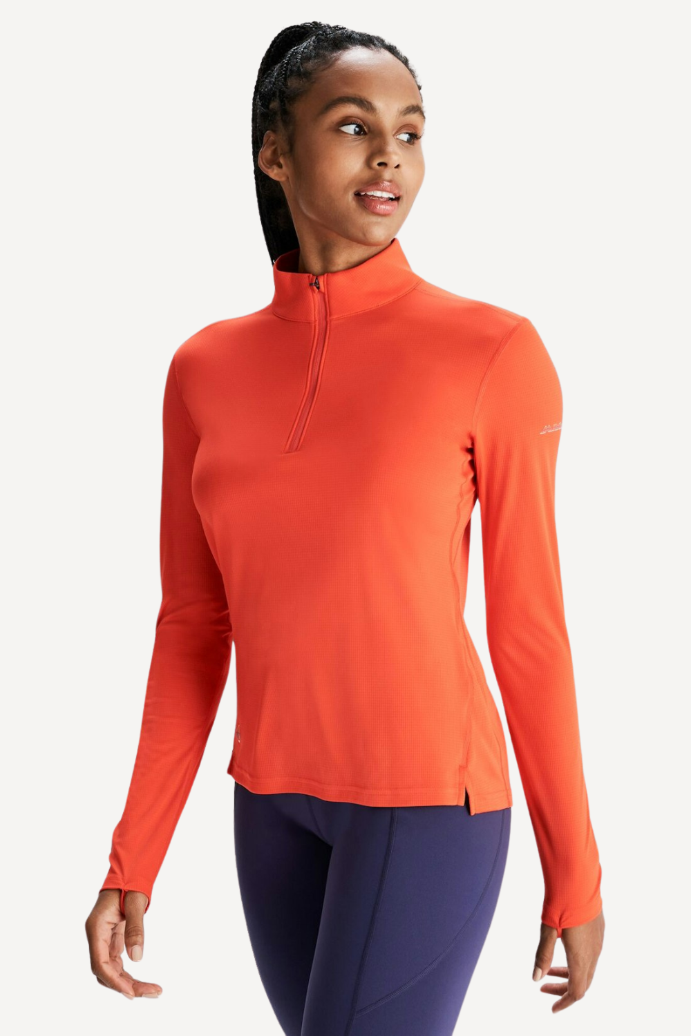 T-shirt anti-UV orange UPF 50+ pour femme, léger et élégant, idéal pour les activités de plein air.